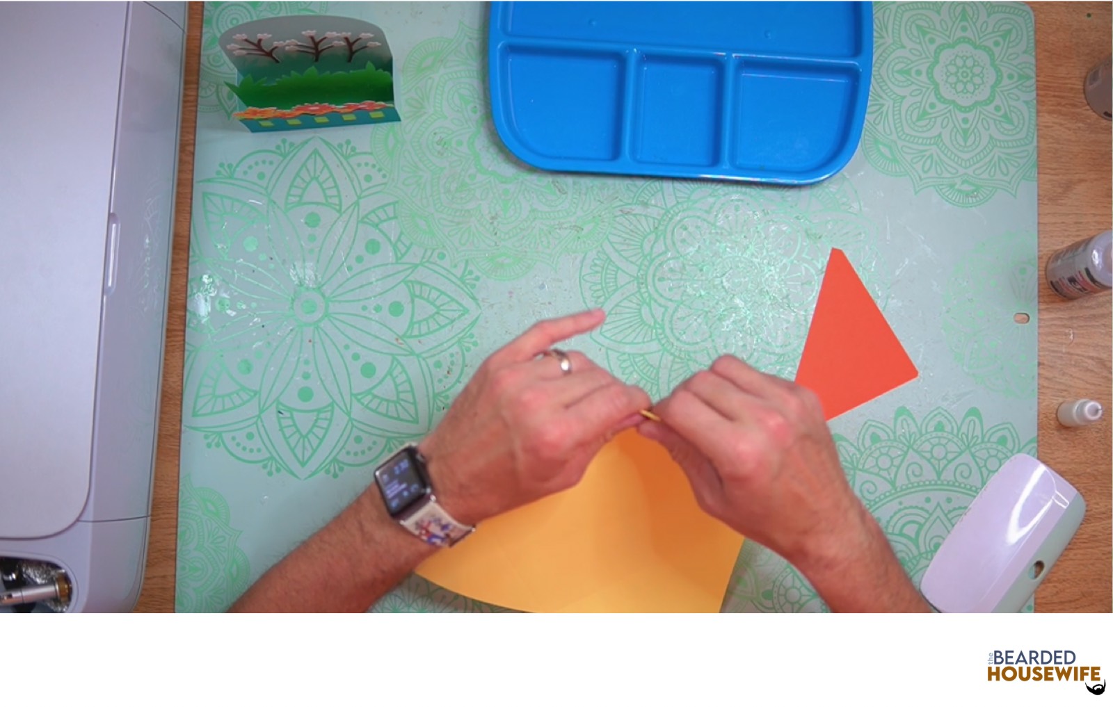 fold the envelope along the score lines