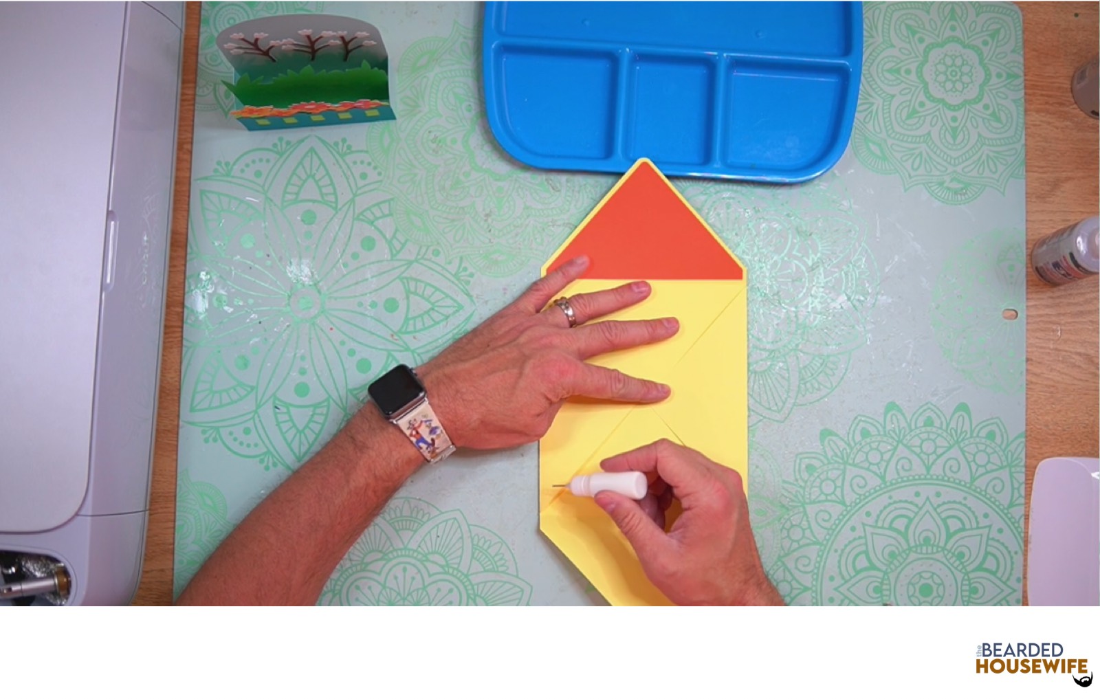 apply glue to the bottom of the side flaps