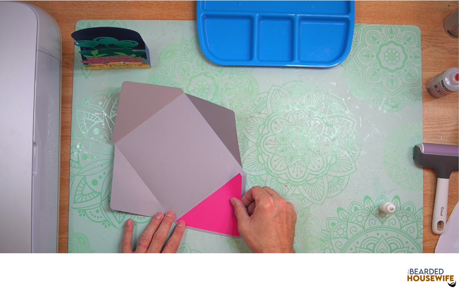 attach the inlay to the envelope