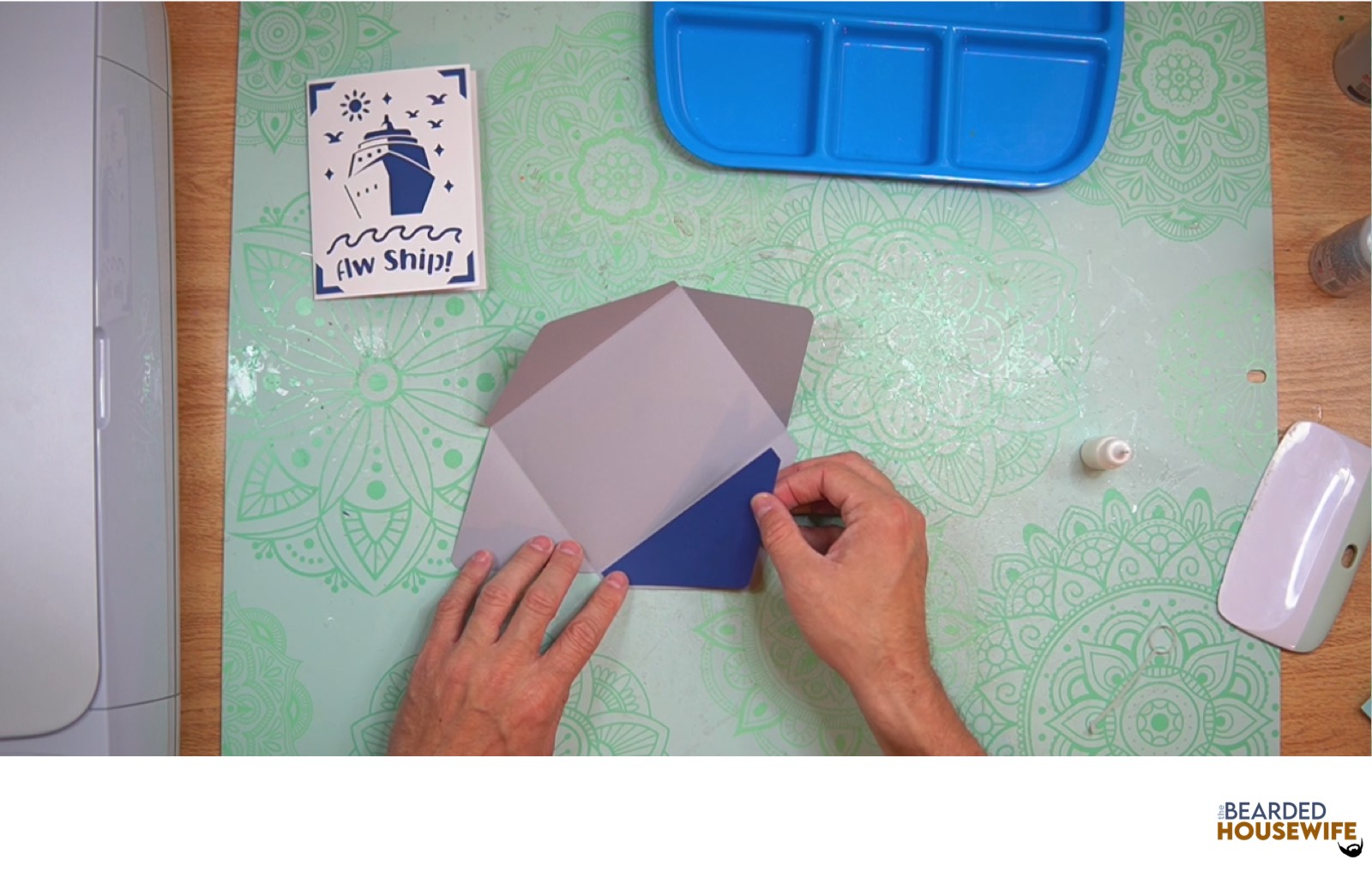attach inlay to the cutout on the envelope flap