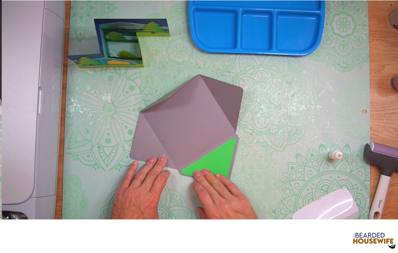 attach inlay over the cutout on the envelope