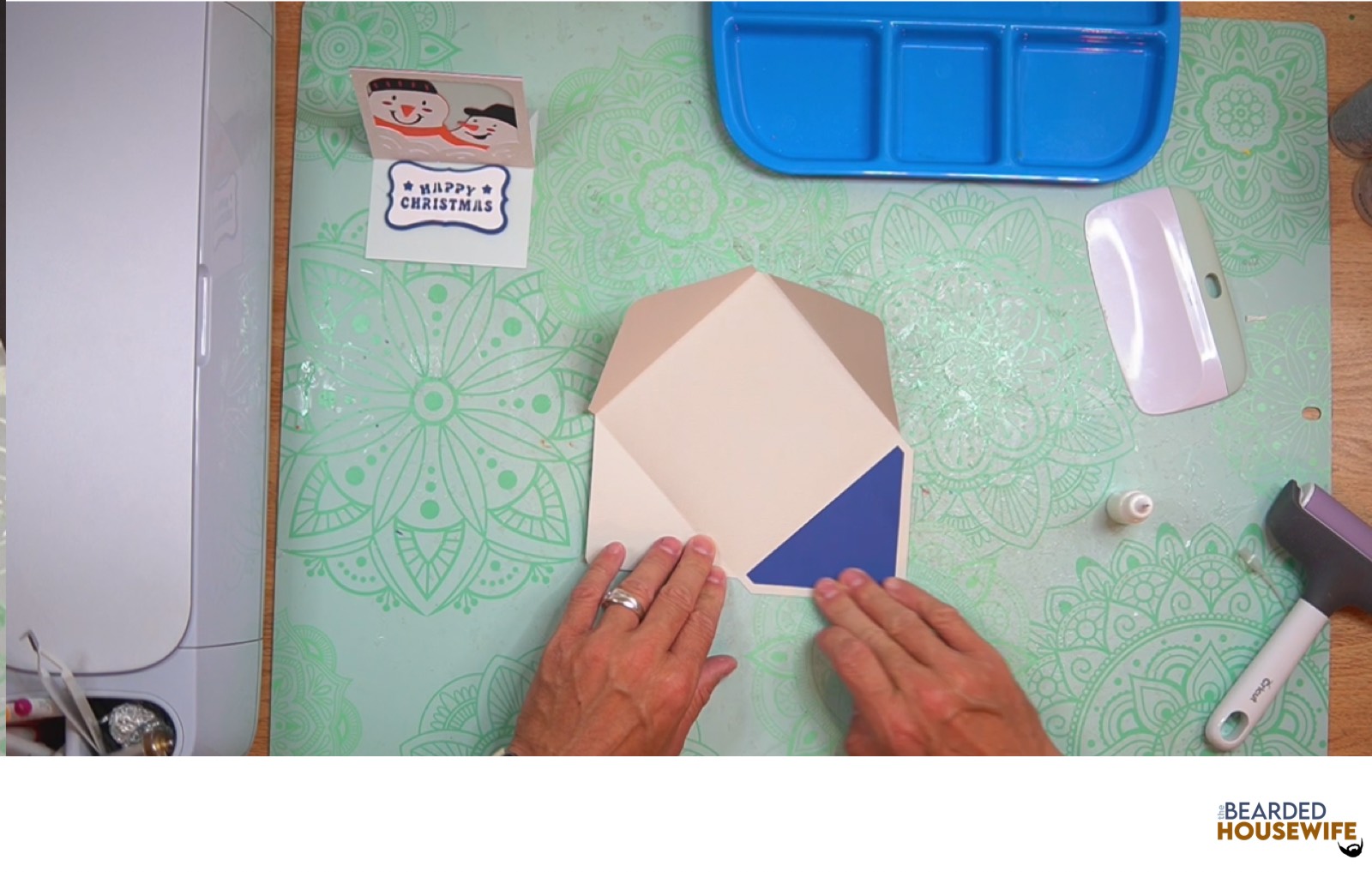 attach the inlay to the envelope