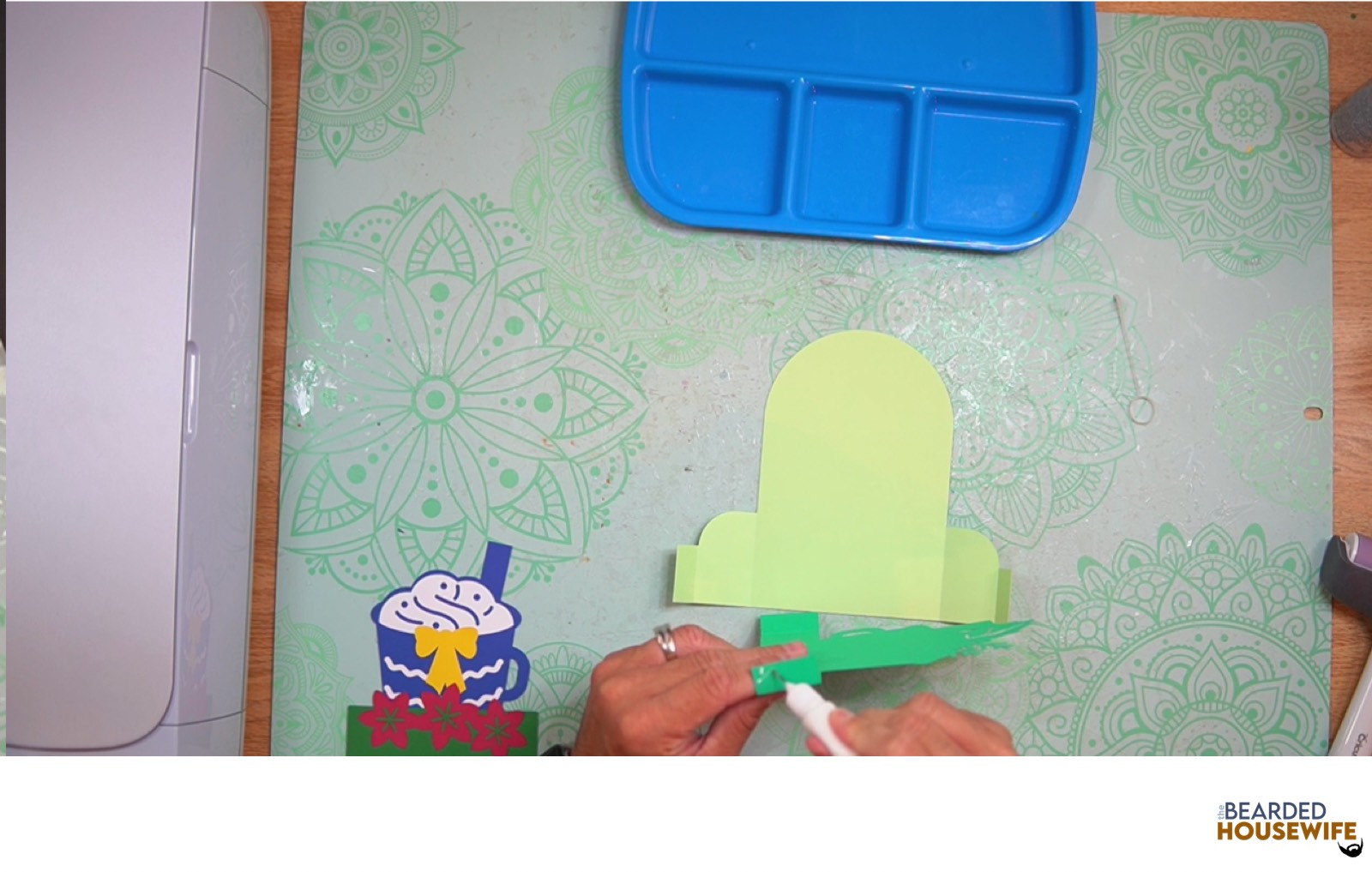 add glue to the left tab on the inside tab piece