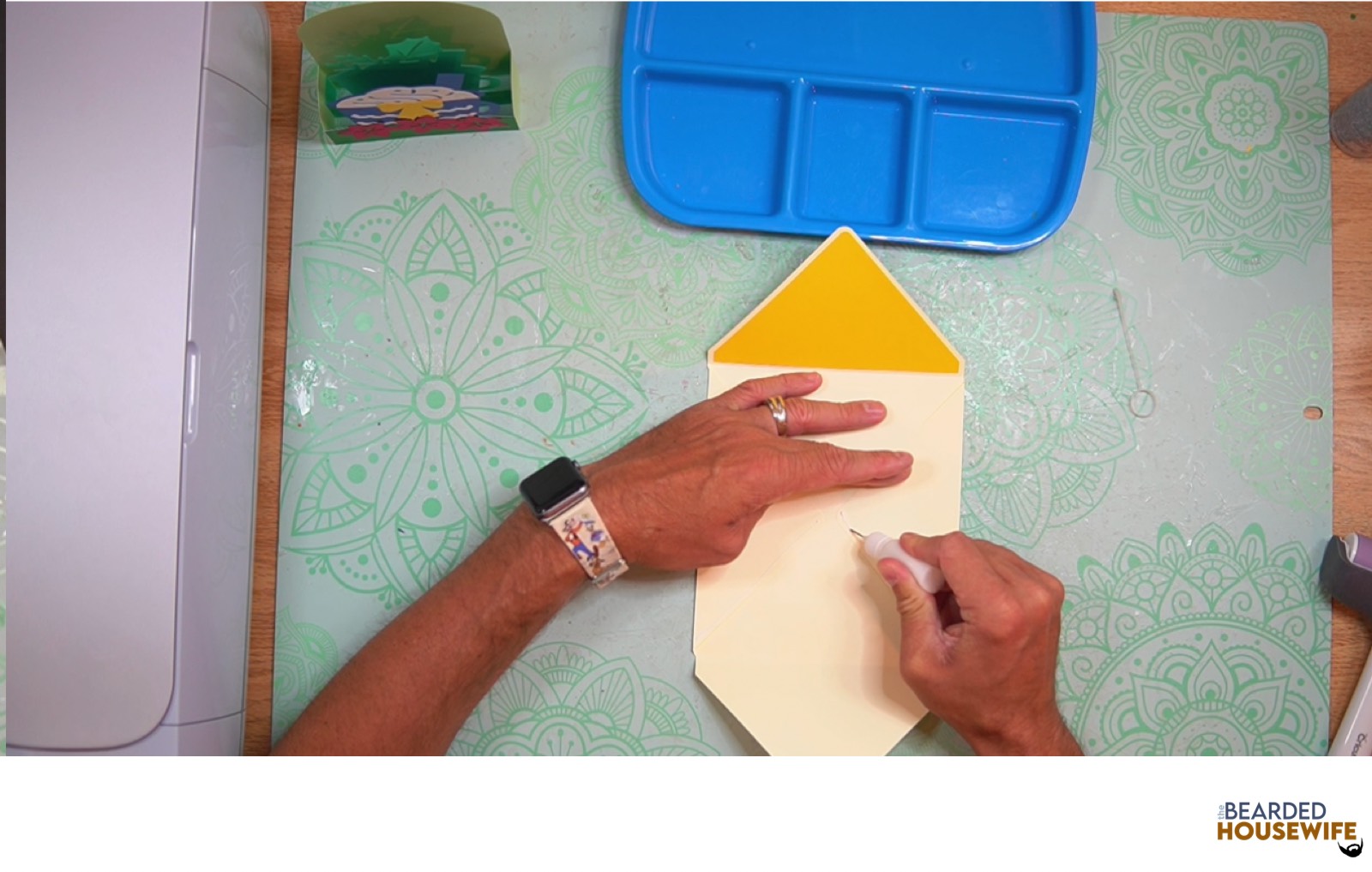 add glue to the bottom of the side flaps