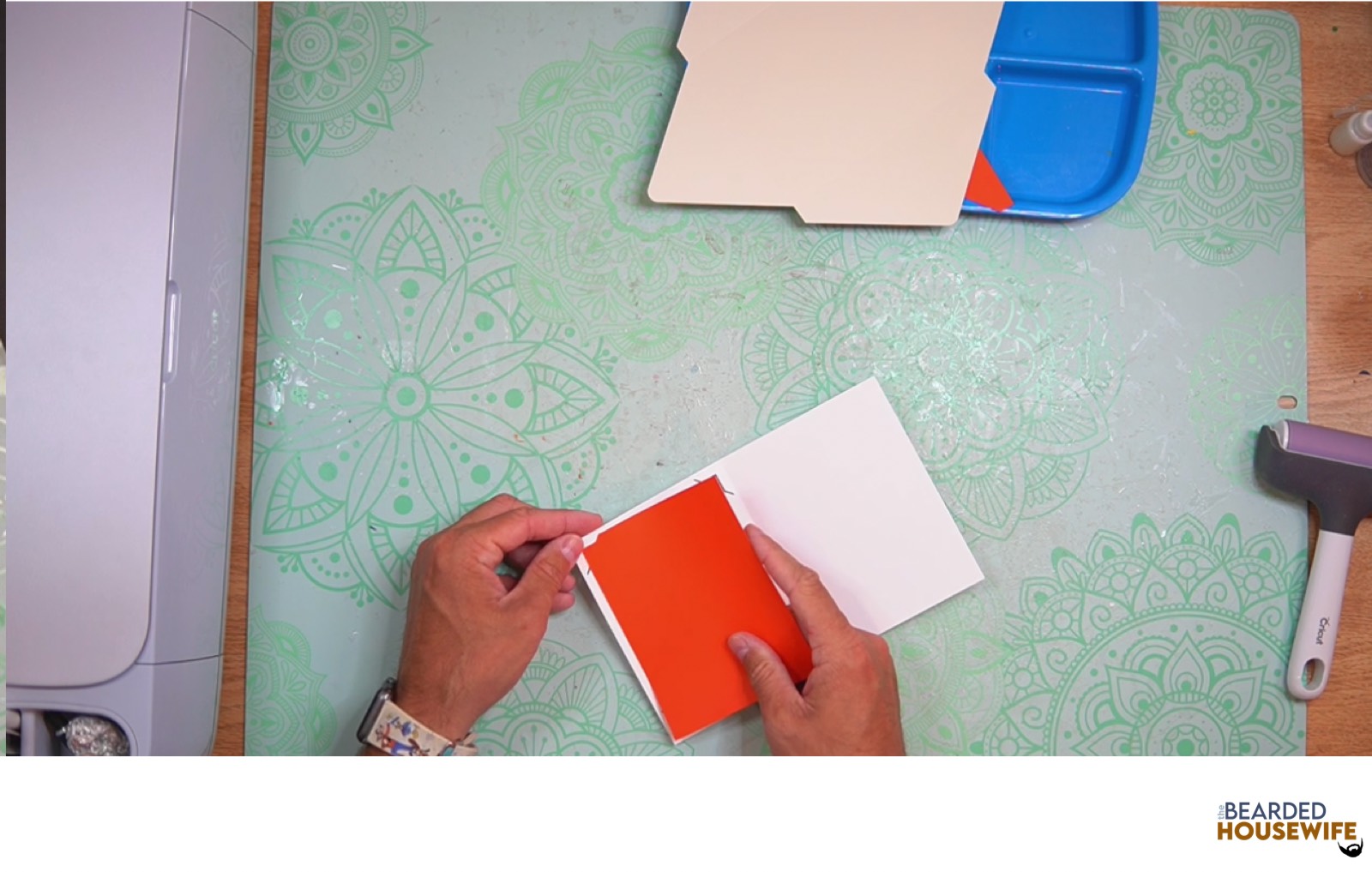 add the insert to the slits on the card base