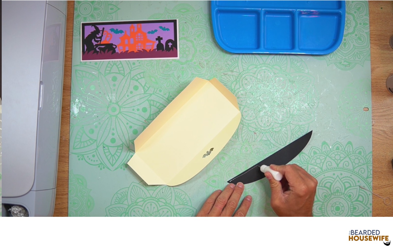 add glue along the outer edge of the inlay panel