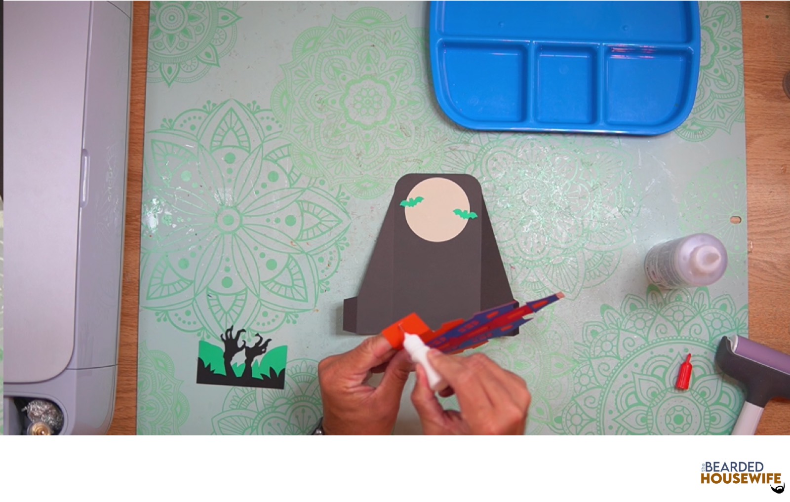 add glue to the left side of the inside tab piece