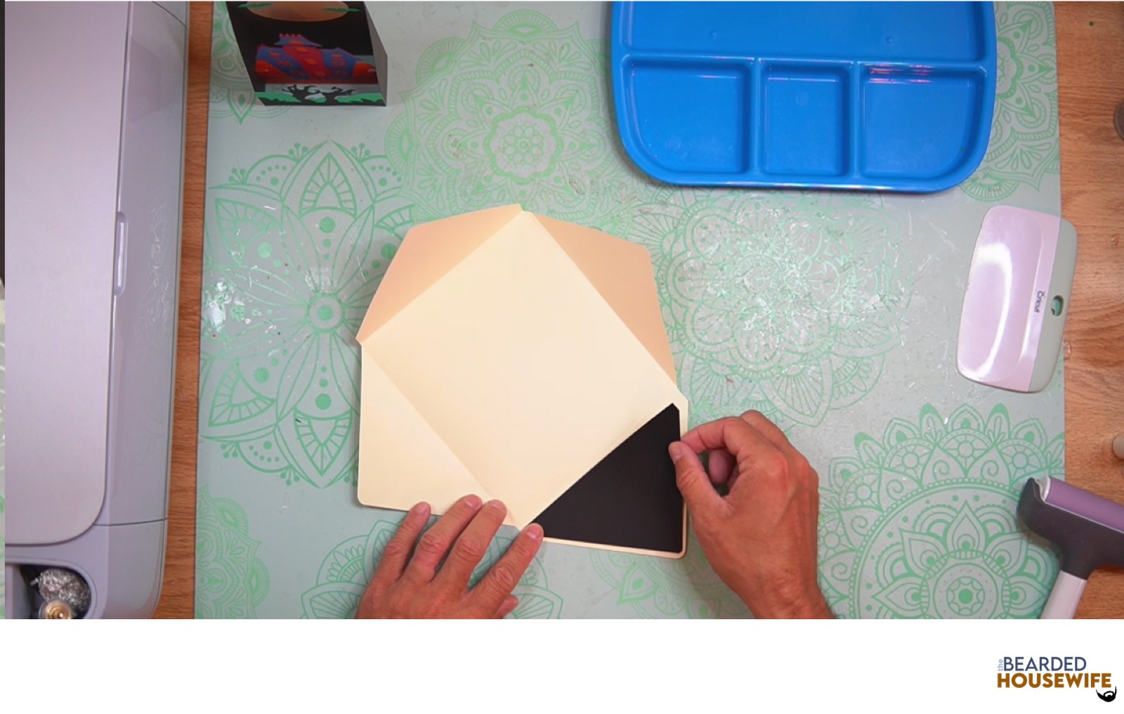 add the inlay to the cutout on the envelope
