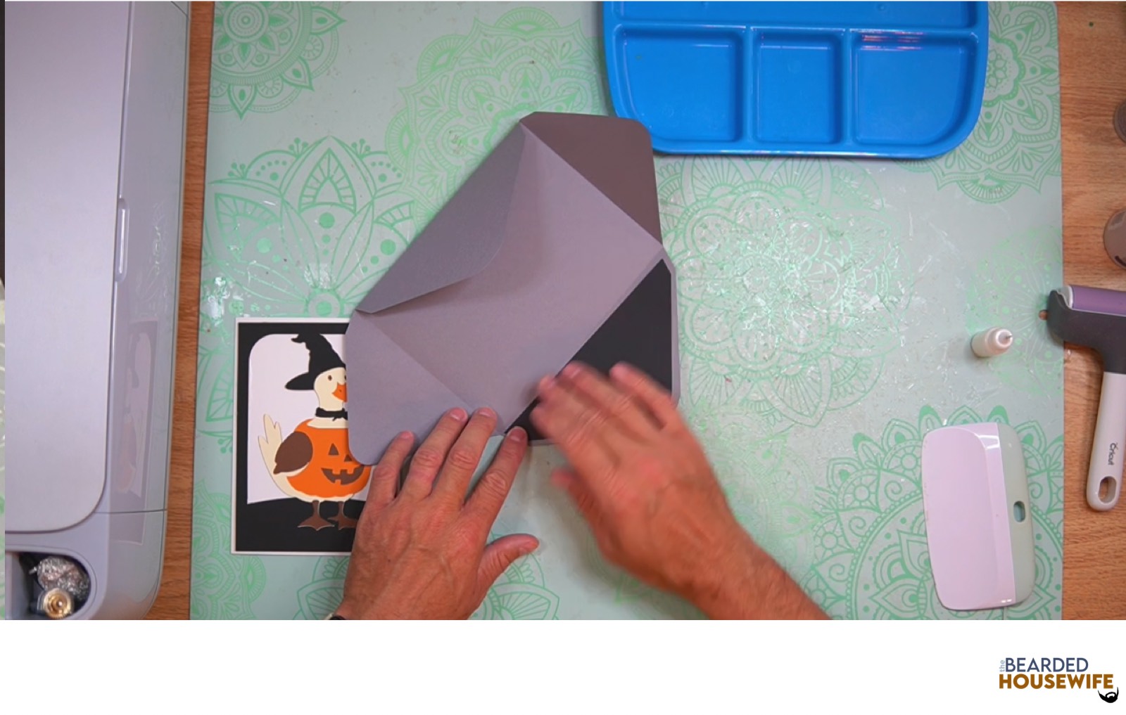add the inlay to the cutout on the envelope flap