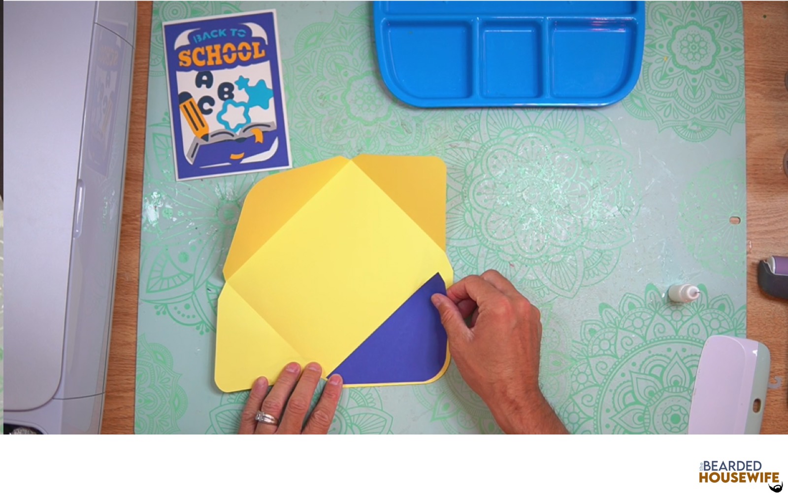 attach the inlay to the envelope