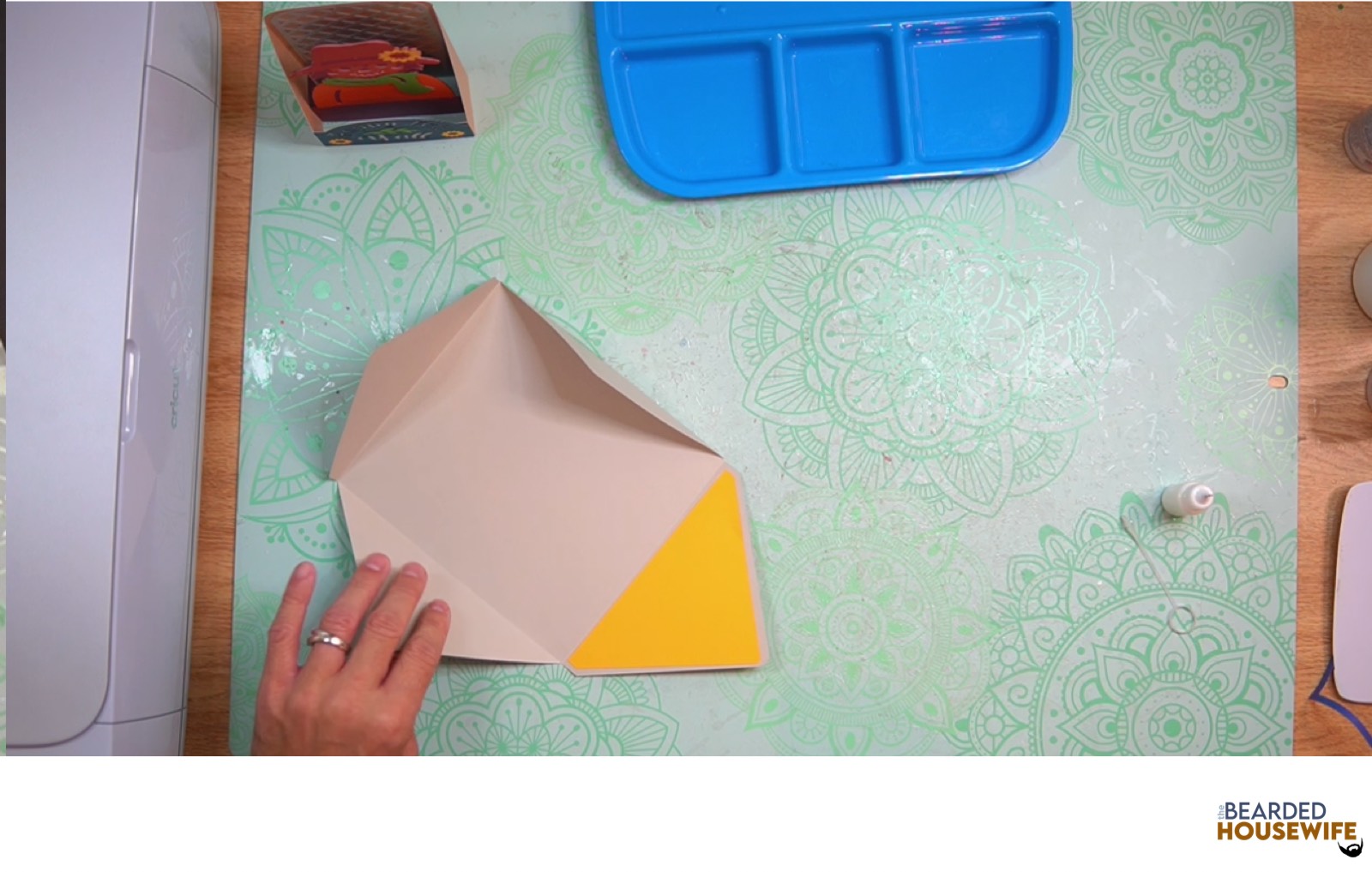 add the inlay to the cutout on the envelope