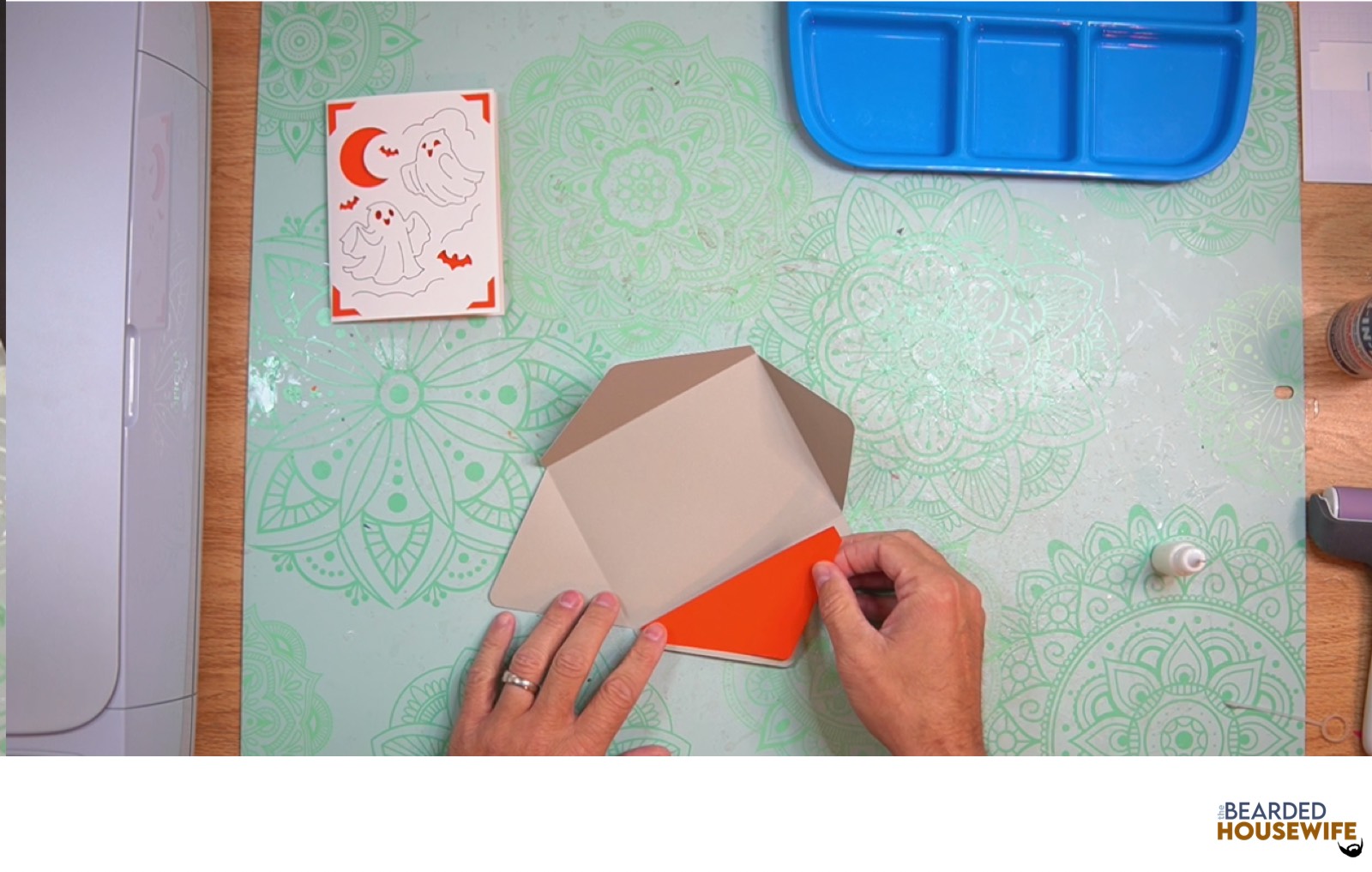 attach the inlay to the cutout on the envelope